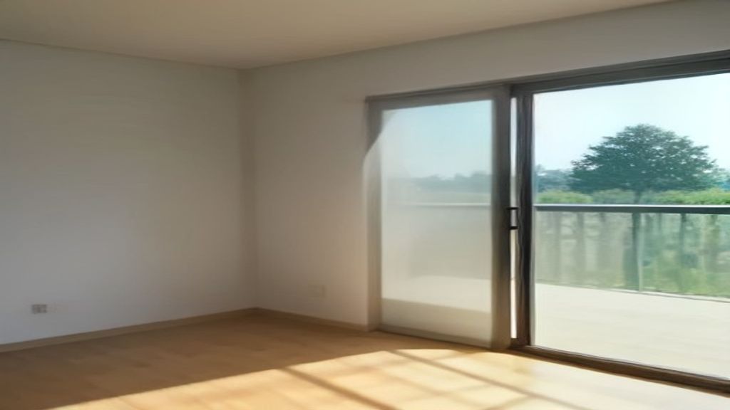 Modern new build flats with sleek balconies and spacious living areas in a vibrant urban development.